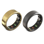 Two Smart Heart Rings, one gold and one black, are shown side by side. Both display visible sensors and electronic components on the inside for heart rate tracking and sleep monitoring.
